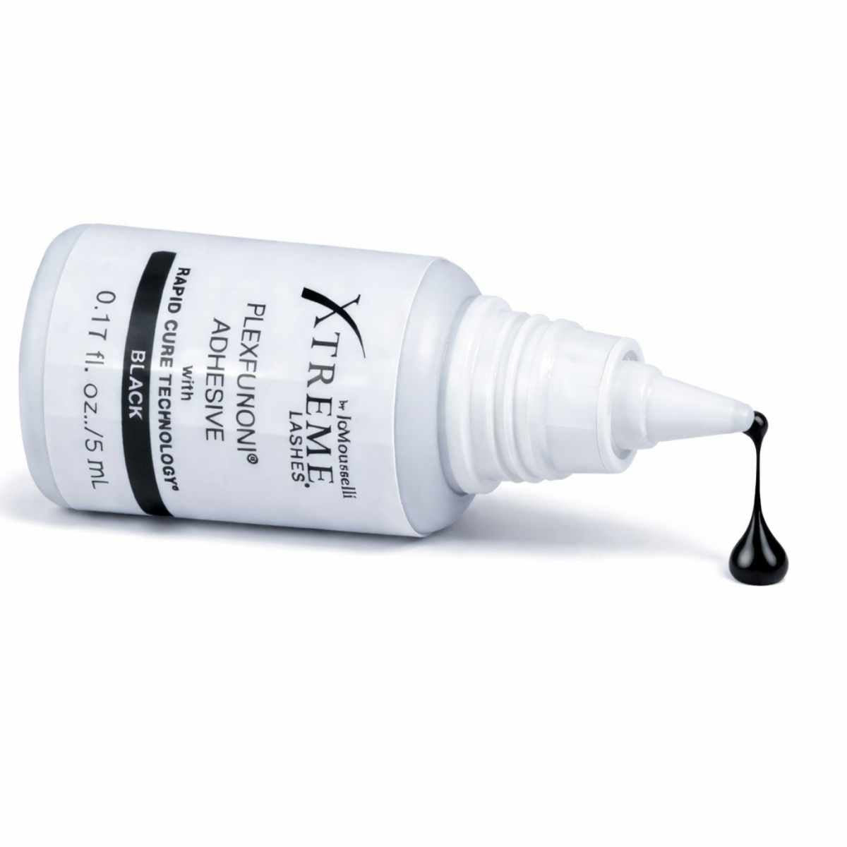 Sensitve Wimpern Kleber Flex Fusion liegend ein tropfen läuft aus der Flasche